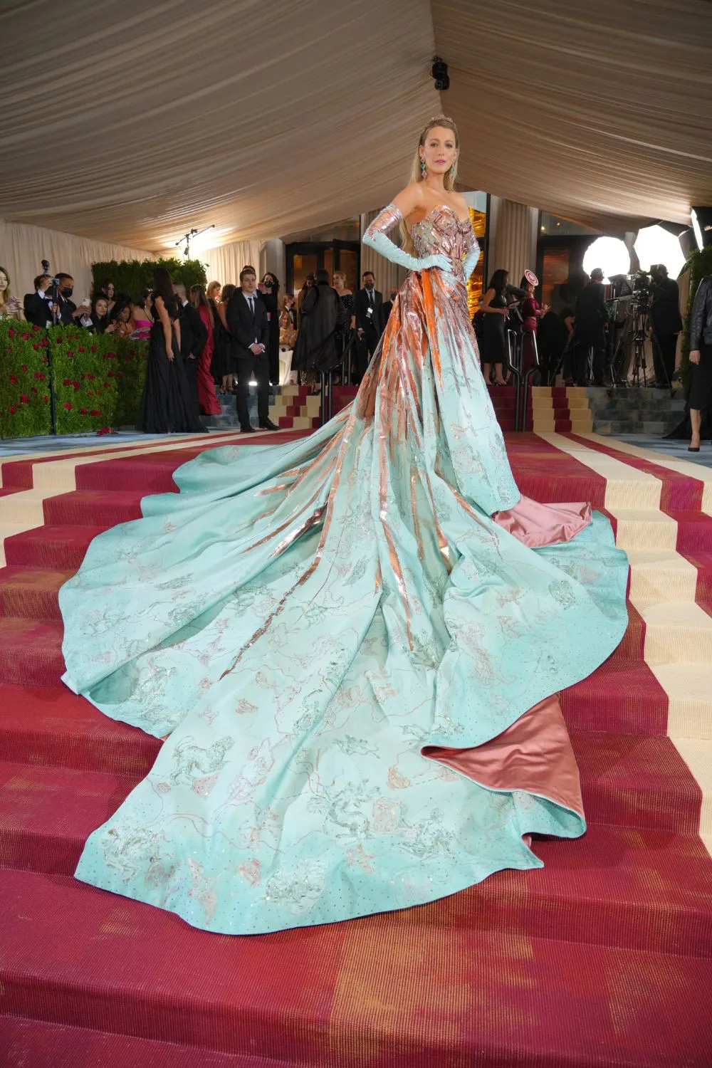 Blake Lively's 2022 Met Gala outfit included metallic pink detailing that really popped against a powder blue.