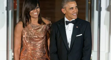 Michelle Obama Steps Out In Glittering Rose Gold Versace