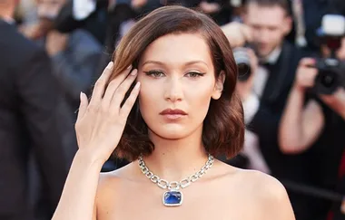 Bella Hadid Fights Off Multiple Wardrobe Malfunctions At Cannes Film Festival