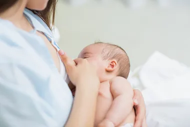 Woman breastfeeding.