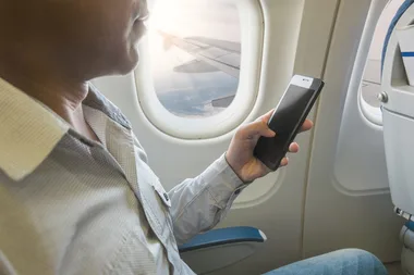 Plane Passenger Spots Man Allegedly Texting About Child Molestation, Leads To Arrests