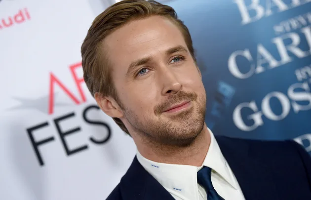 Portrait of a man in a suit at a film festival event.