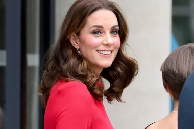 Kate Middleton Steps Out In A Little Red Dress That Shows Off Her Growing Baby Bump