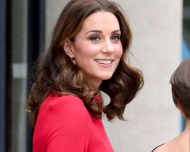 Kate Middleton Steps Out In A Little Red Dress That Shows Off Her Growing Baby Bump