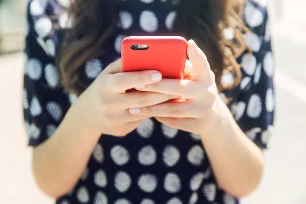 woman holding phone 2