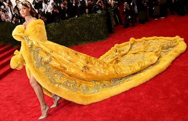Rihanna wearing yellow dress at met gala