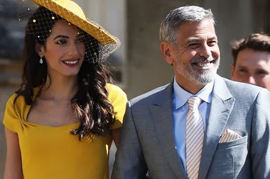 Amal Clooney Arrives At The Royal Wedding Wearing Head-To-Toe Yellow