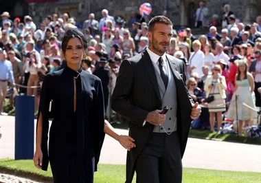 Victoria Beckham Arrives Hand-In-Hand With David Beckham At The Royal Wedding