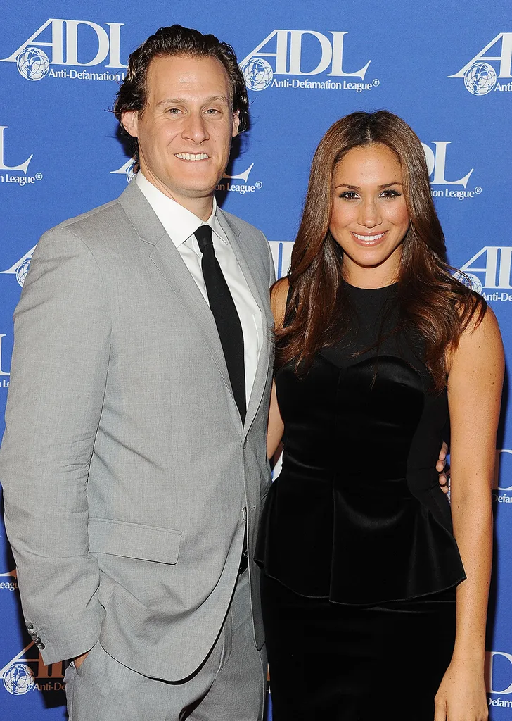 Trevor Engelson and Meghan Markle