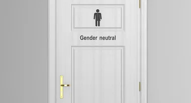 Gender-neutral restroom door with symbol and black text on a white background.
