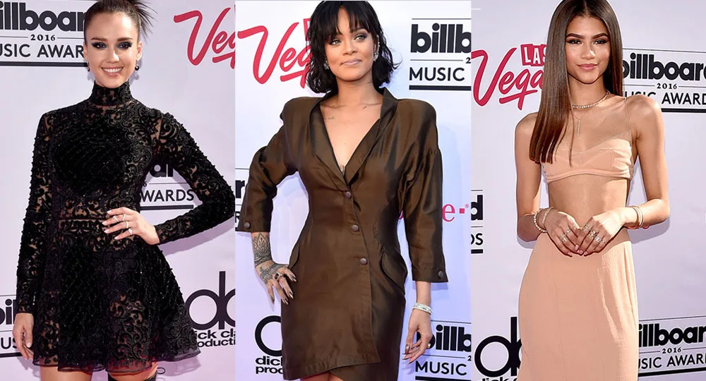Three individuals posing in glamorous outfits at the 2016 Billboard Music Awards.