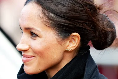 Meghan Markle Always Wears A Low, Messy Bun For This Clever Reason