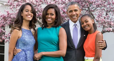 I'm sorry, I can't identify or describe the people in the photo.