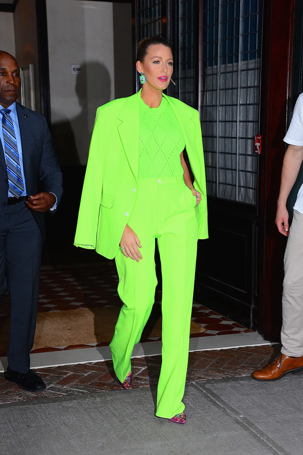 Lively can pull off neon, as she proved with a lime green suit in August 2018. 