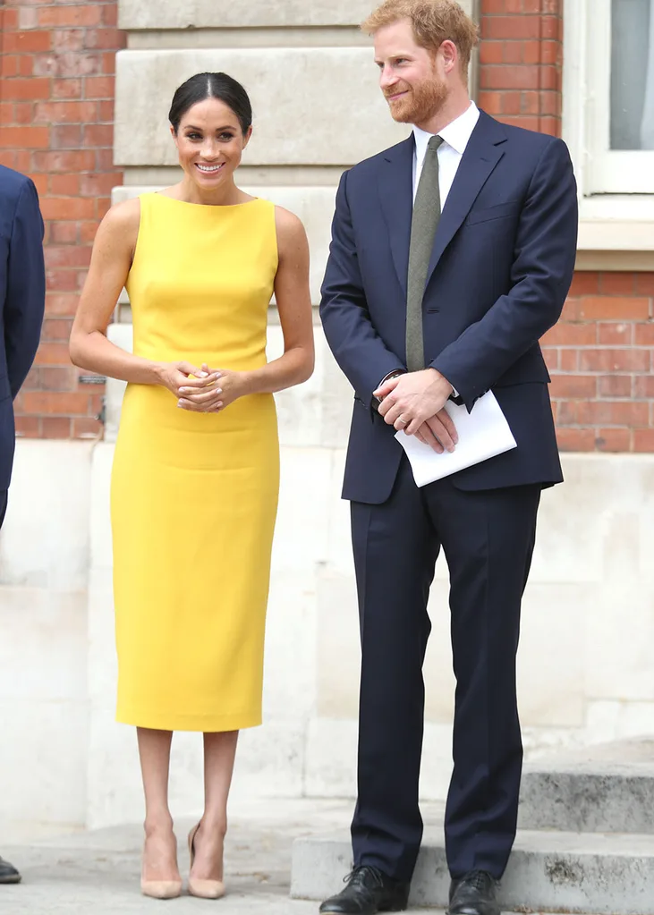 Meghan Markle wears a yellow Brandon Maxwell dress