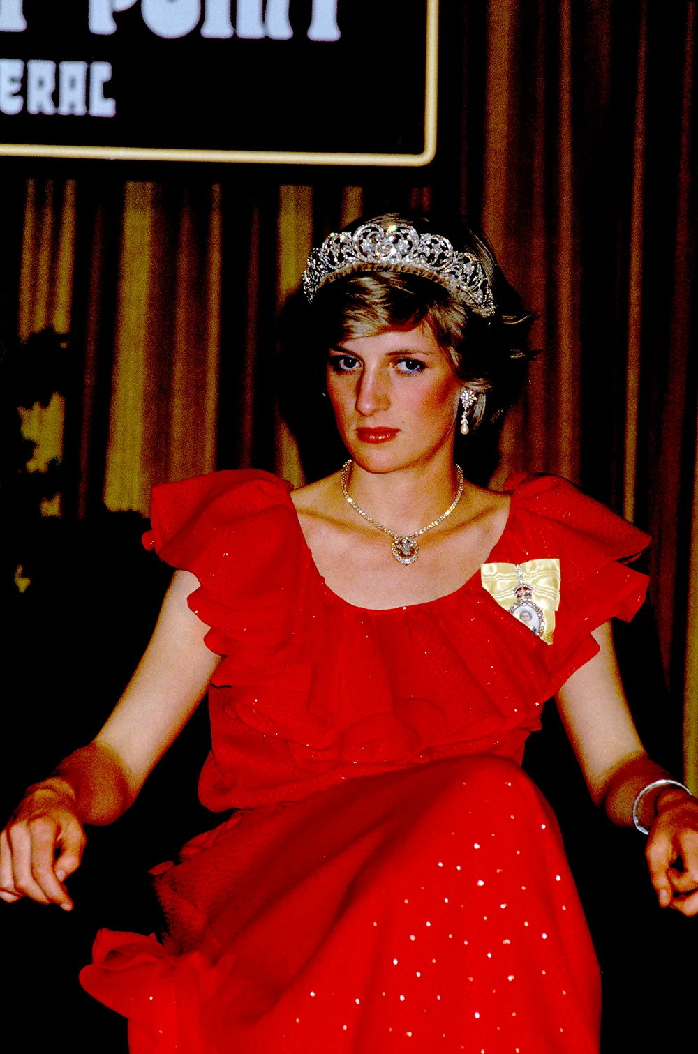 princess diana wore a red dress and the spencer family tiara in hobart.