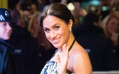 Pregnant Meghan Markle Reveals Her Growing Baby Bump In Sequin Dress