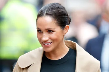 Meghan Markle Steps Out In Her First Maternity Dress