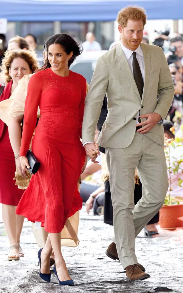 Prince Harry, Duke of Sussex and Meghan, Duchess of Sussex arrive at Nuku'alofa airport on October 25, 2018 in Nuku'alofa, Tonga