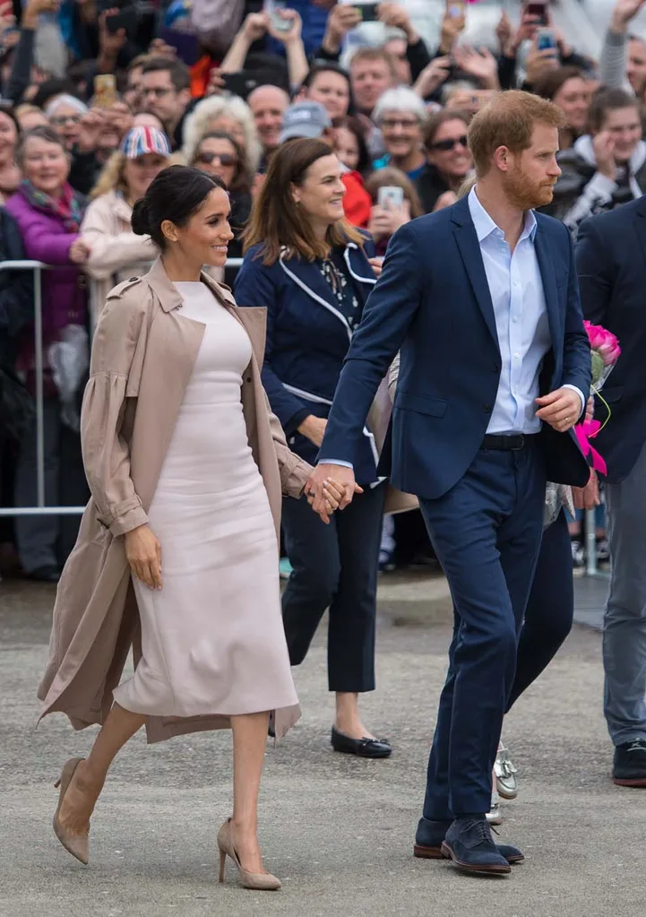 The Duke and Duchess of Sussex during a walkabout at Viaduct Harbour, in Auckland, on day three of the royal couple's tour of New Zealand