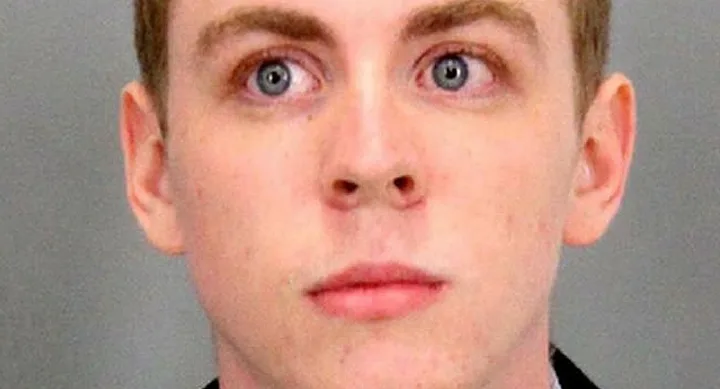 Alt text: "Close-up of a young man's face with light skin and short hair."