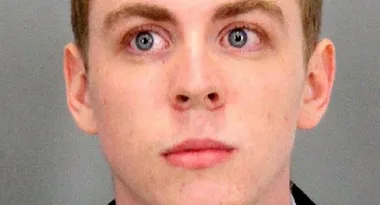 Alt text: "Close-up of a young man's face with light skin and short hair."