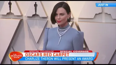 Charlize Theron arrives on the 2019 Oscars red carpet