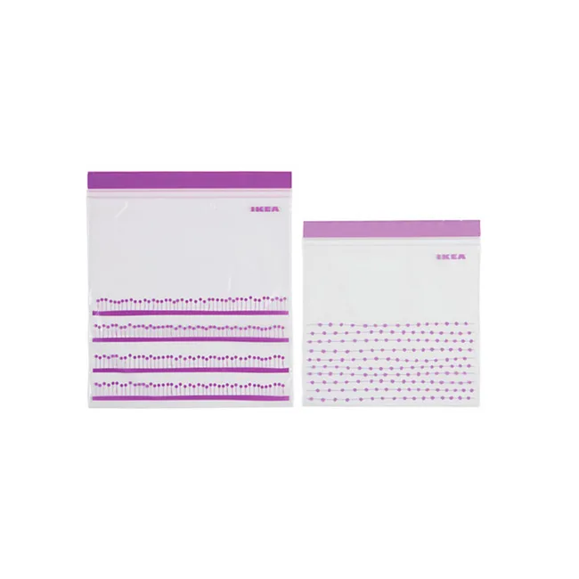 Two IKEA resealable bags with purple stripe designs, one larger and one smaller, both empty and transparent.
