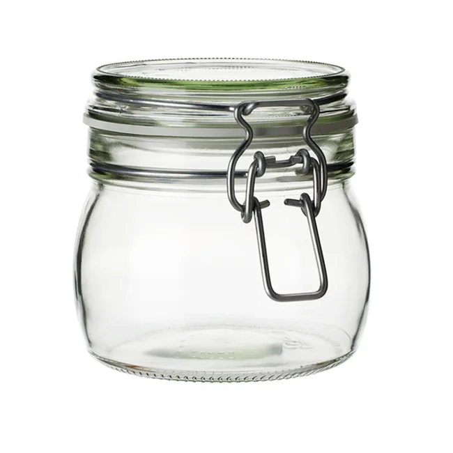 Glass jar with metal latch and airtight seal, empty and isolated on a white background.