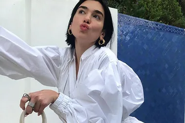 Dua Lipa’s Tiny Straw Bag Is The Late Summer Accessory We All Need