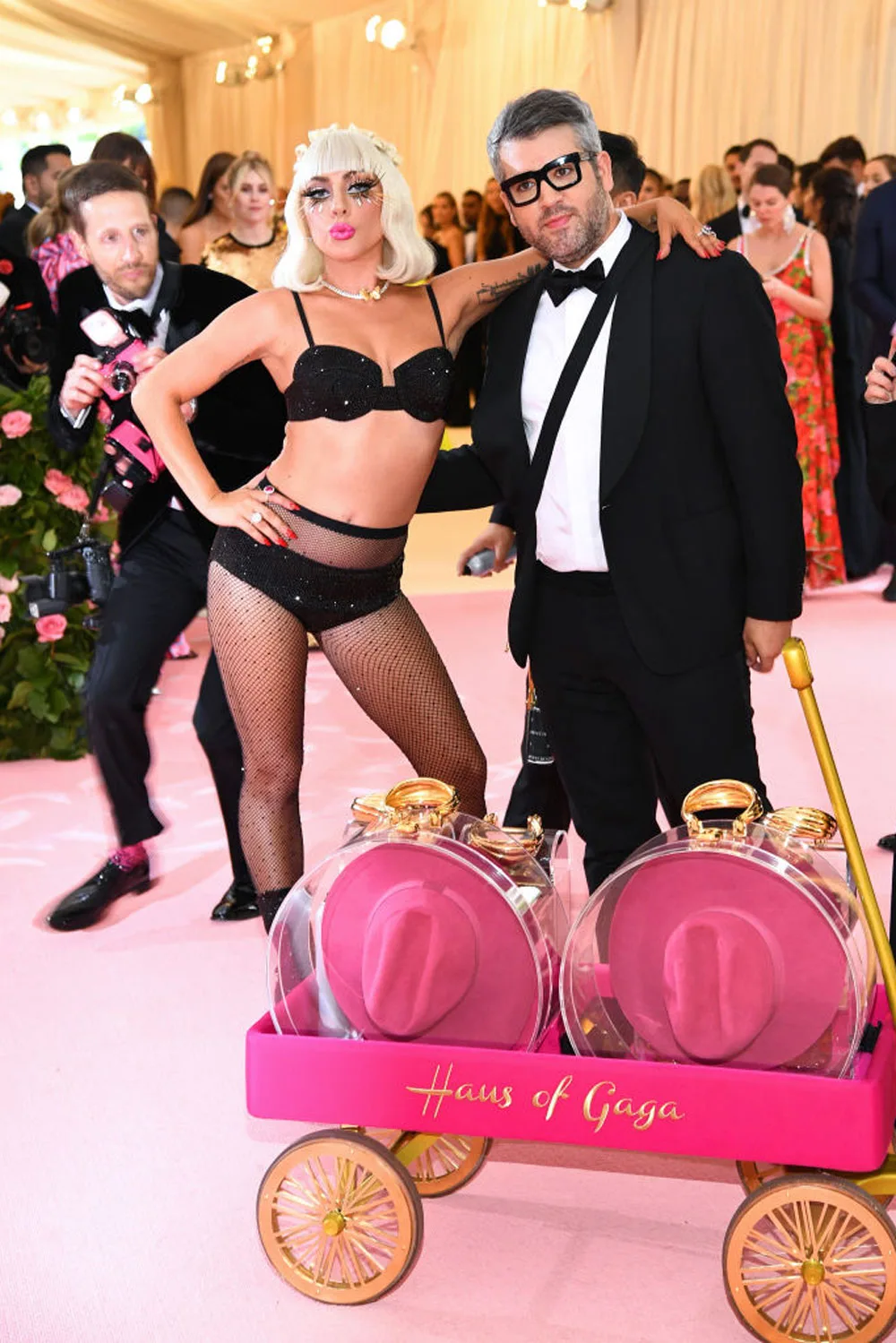 lady gaga's fourth look to the 2019 met gala was sparkly black lingerie with gem studded fishnets and black boots