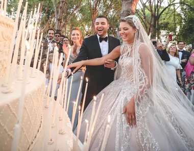 Elie Saab Designed 2 Incredible Custom Wedding Dresses for His Daughter-In-Law