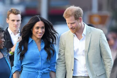 A Video Of Prince Harry Fixing Meghan Markle’s Hair Has The Internet Swooning