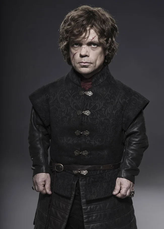 Character dressed in dark medieval clothing with facial scars, standing against a plain background.