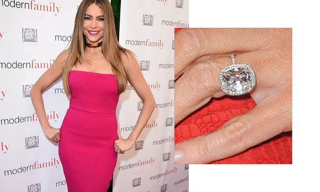 Woman in pink dress at "Modern Family" event, inset shows a large square diamond ring on her finger.
