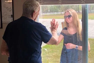 Woman Sharing Her Engagement News With Grandfather Through Window Goes Viral