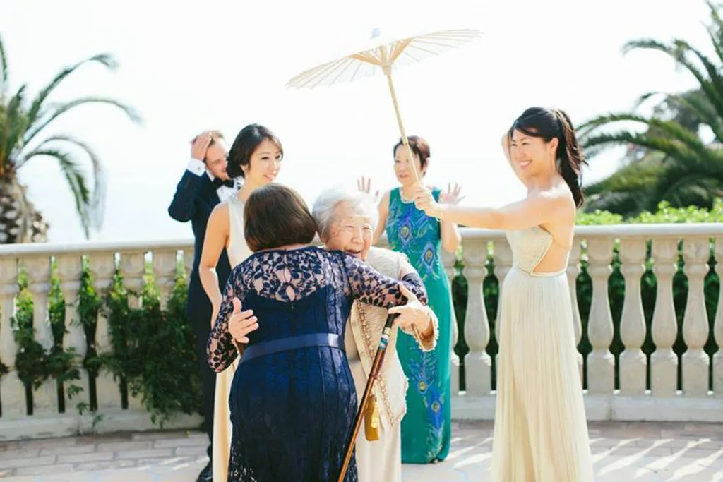 Three generations of Chang women—the author, her sister, her mother, and her grandmother—at the author's sister's wedding in Los Angeles.