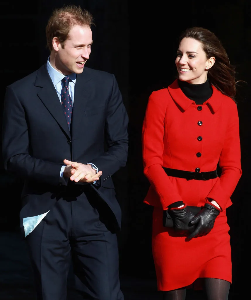 Prince William and Kate Middleton smile as they visit the University of St Andrews