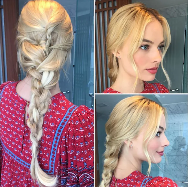 Blonde woman with braided hairstyle, wearing a red patterned dress, shown from back and side views in a well-lit room.