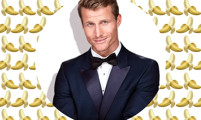 Man in a tuxedo smiling with a background of banana emojis.