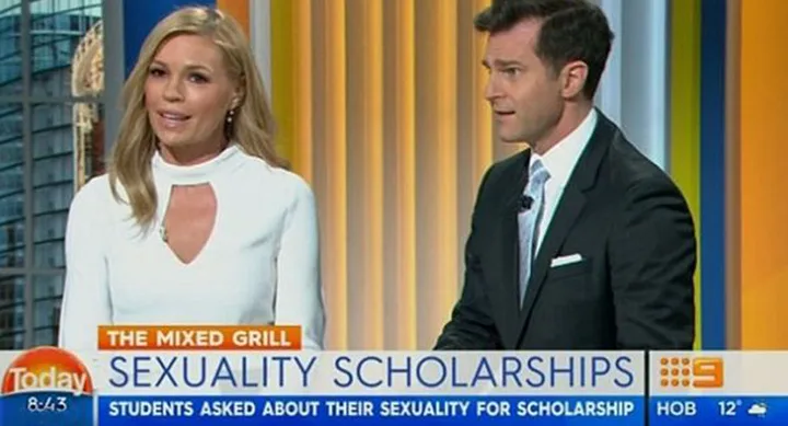 News anchors discuss "Sexuality Scholarships" on TV with headline on screen.