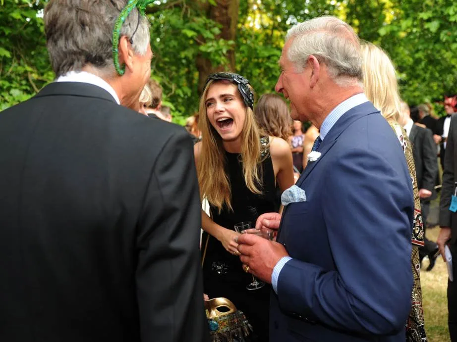 Cara Delevingne meeting Prince CharlCara Delevingne meeting Prince Charles in 2013.es in 2013.