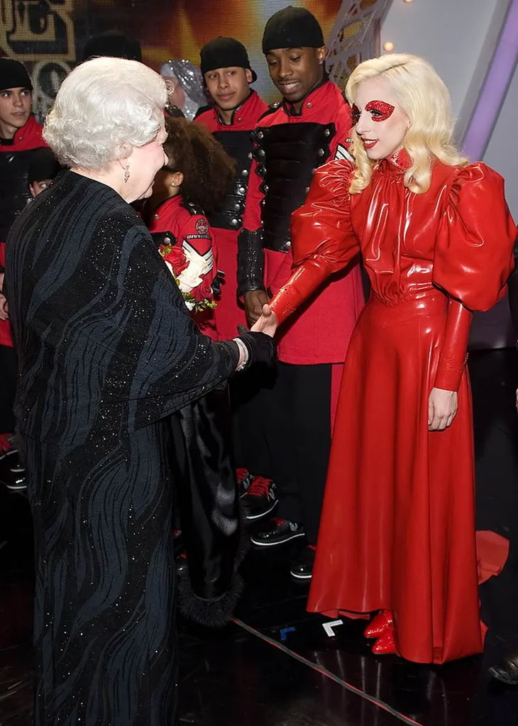 Lady Gaga meeting Queen Elizabeth II in 2009.