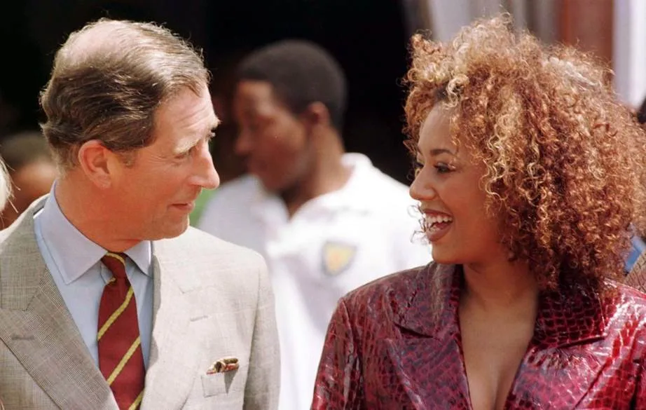 Mel B meeting Prince Charles in 1997.