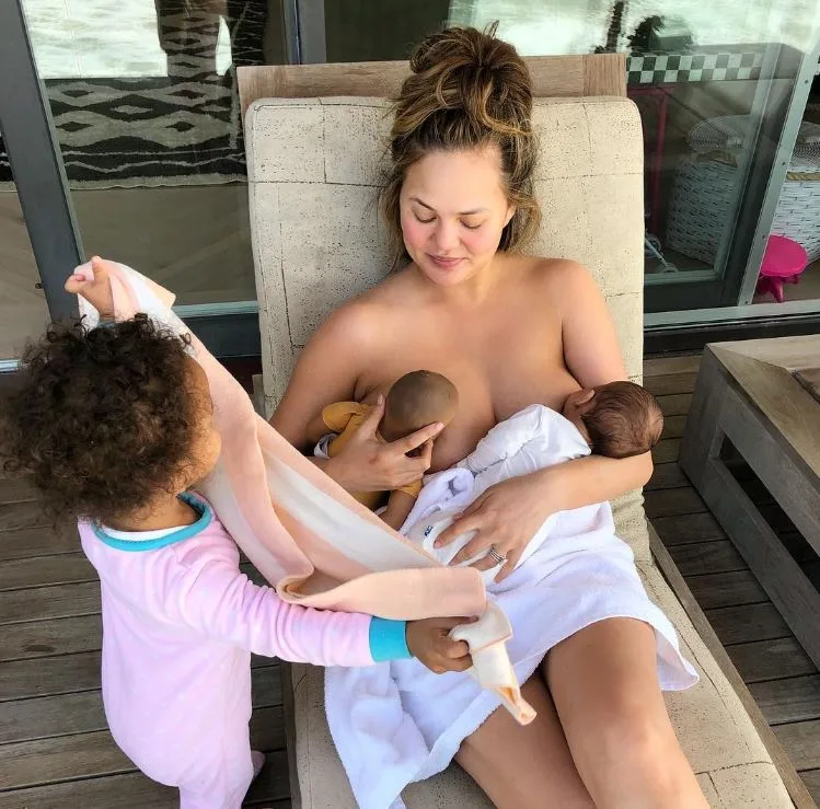 Chrissy Teigen breastfeeding