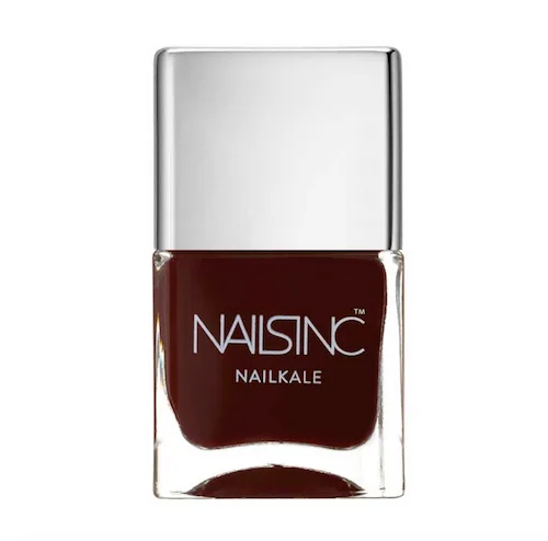 Nails Inc Nailkale dark red nail polish bottle with silver cap, showing logo on front.