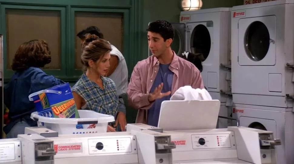 Ross and Rachel from friends doing laundry