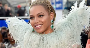 Beyonce Walks The MTV Red Carpet In A See-Through Feather Dress