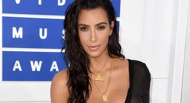 Kim Kardashian Goes Completely Sheer In Black Mini At VMAs