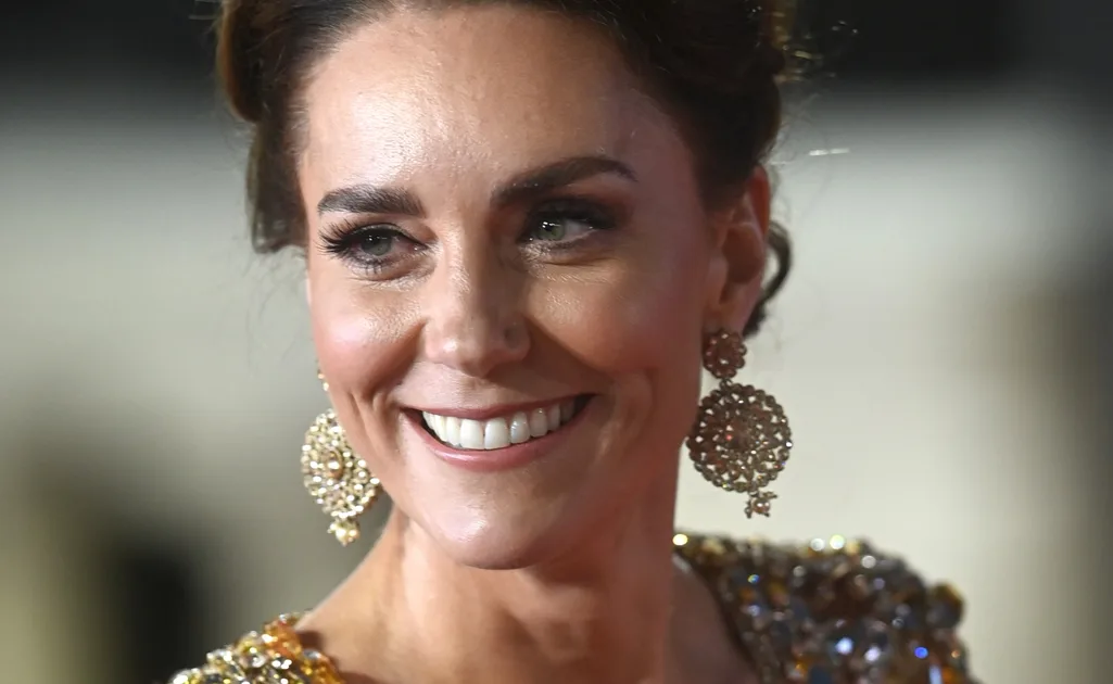 Kate Middleton Glimmers In A Gold Dress For New James Bond Film Premiere